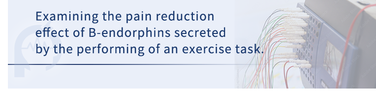 Examining the pain reduction effect of B-endorphins secreted by the performing of an exercise task.